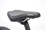 Red Ridgeback MX16 kids' bike with 16-inch wheels, adjustable frame, suitable for ages 3.5 to 6 years, detailed close-up.