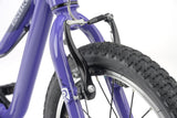 Ridgeback MX16 kids bike with 16-inch wheels in lilac, adjustable frame for children aged 3.5 to 6 years, detailed close-up.
