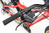 Red Ridgeback Dimension 24 kids bike with 8-speed Shimano gears, puncture-resistant tires, and adjustable fit for children 8+.
