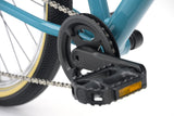 Ridgeback Dimension 24 kids bike in teal with 8-speed Shimano gears, puncture-resistant tires, adjustable fit for ages 8+