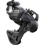 Shimano XTR RD-M9250 Di2 wireless 12-speed rear derailleur for MTB with GS Hyperglide design, showcasing its sleek component profile.
