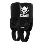 TSG single ankle guard pad with cam protection for biking safety, shown on a rider's ankle in protective gear.