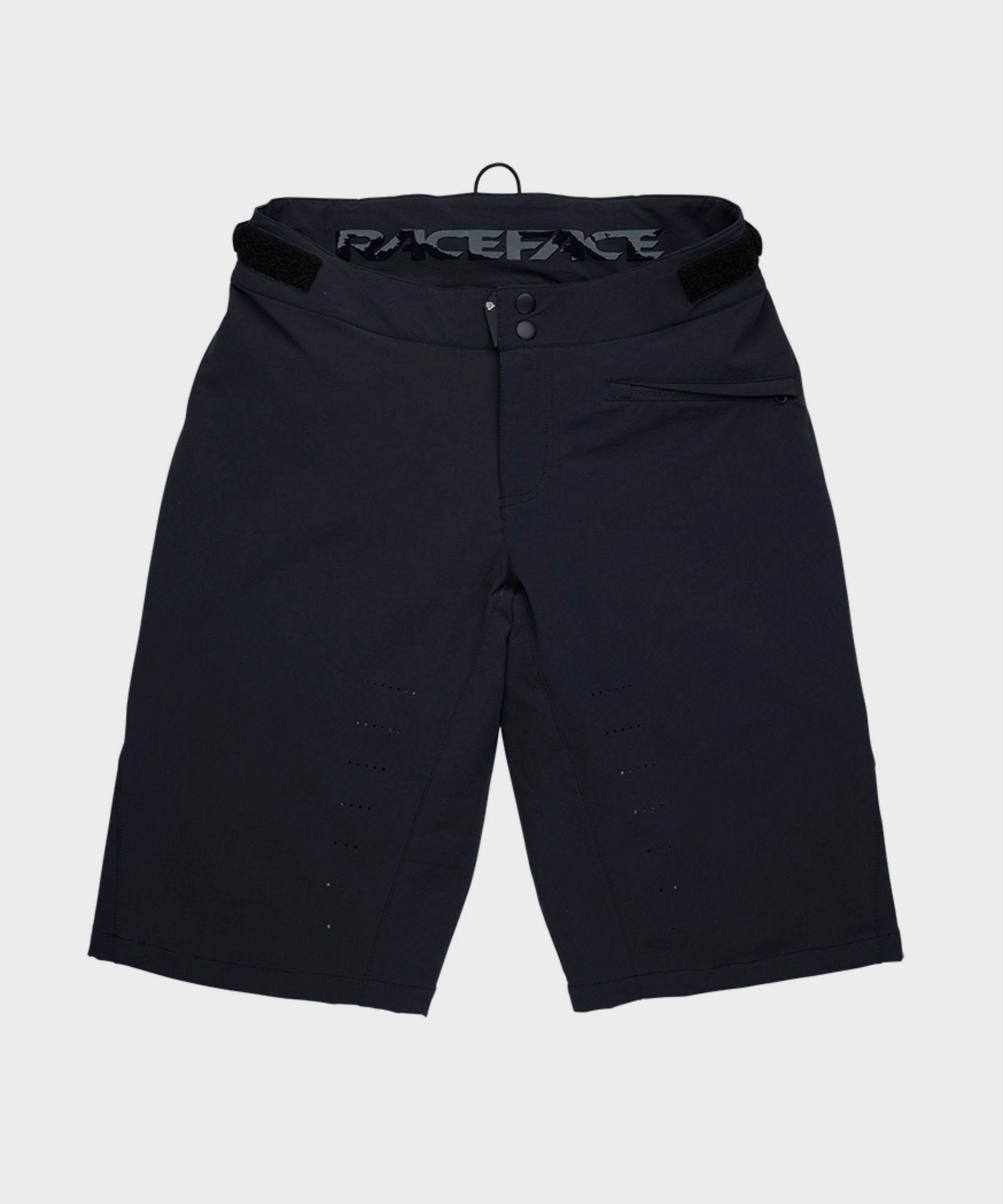 Race Face Indy Women's Mountain Bike Shorts with adjustable waist and zippered pockets, designed for cycling comfort.