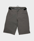 Race Face Indy Women's Mountain Bike Shorts showing adjustable waist, zippered pockets, and durable outdoor clothing design.