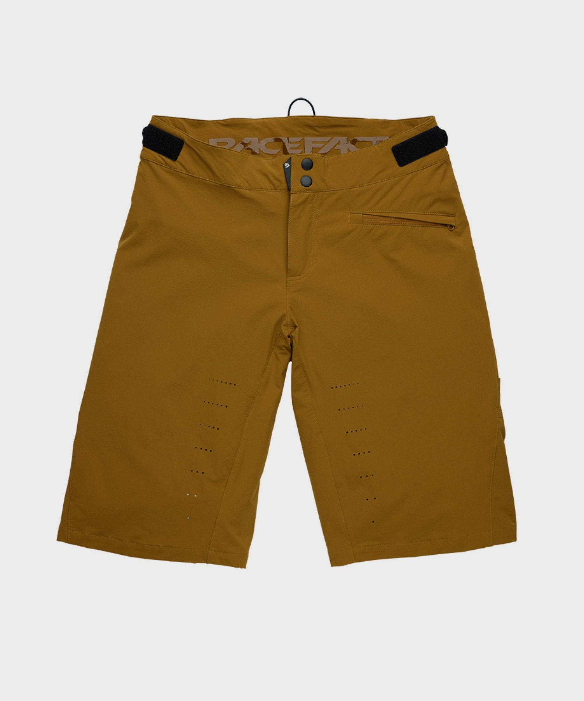 Race Face Indy Women's Mountain Bike Shorts with adjustable waist and zippered pockets, designed for comfort and durability.