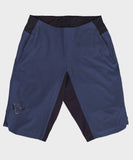Race Face Traverse women's mountain biking shorts with zippered pockets and ventilation, designed for outdoor cycling comfort.
