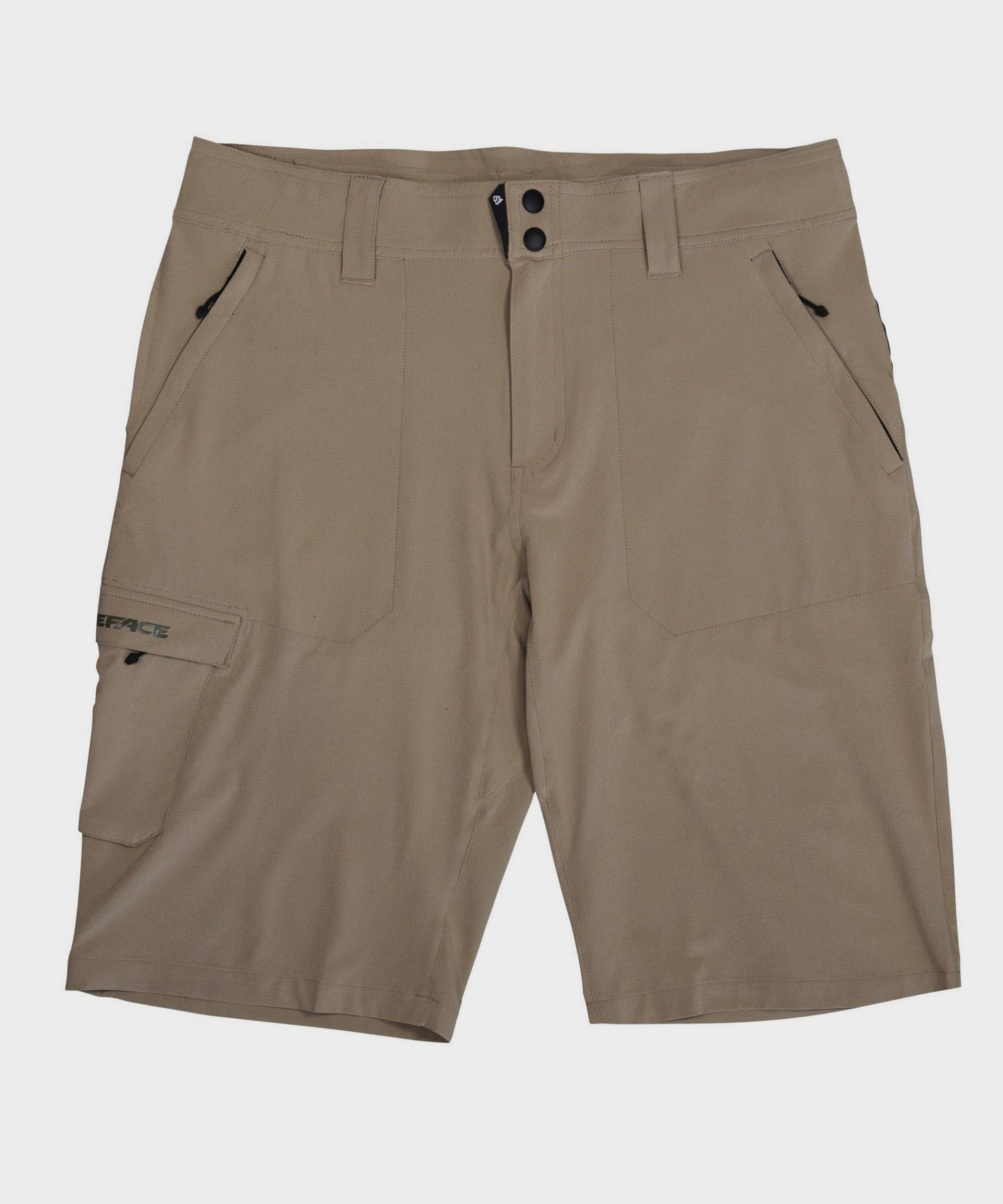 Lightweight Race Face Trigger MTB riding shorts with breathable fabric and adjustable waistband, designed for comfortable mountain biking.
