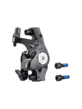 Tektro Novela mechanical disc brake calipers in black, front and rear, for Trek bike components, shown in a natural setting.