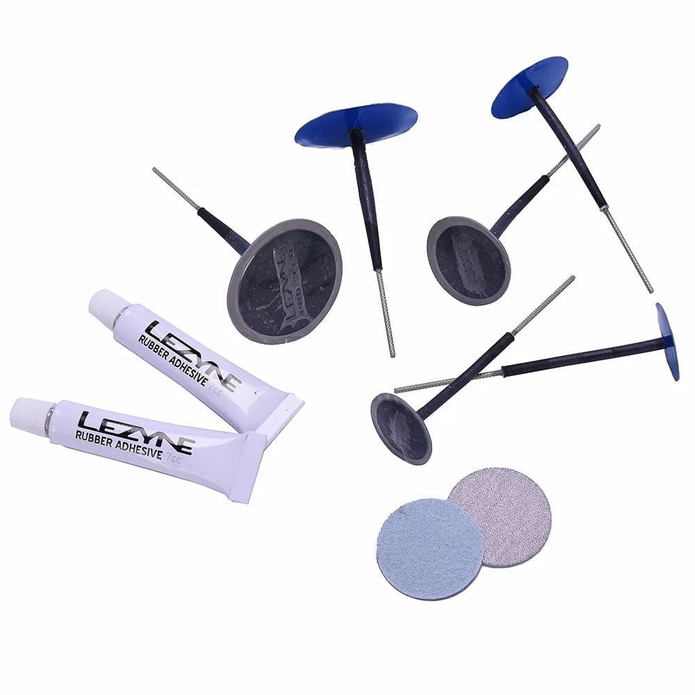 Lezyne Tubeless Pro Plugs Kit for durable tubeless tire repair in black, components for seamless bike tire maintenance.