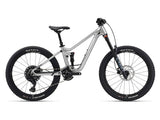 Giant Faith 24 youth mountain bike with suspension and dropper seatpost, showing sturdy frame and off-road tires.