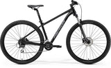 Merida Big Nine 20 SE aluminum hardtail mountain bike with Shimano Acera components, black frame and knobby tires.
