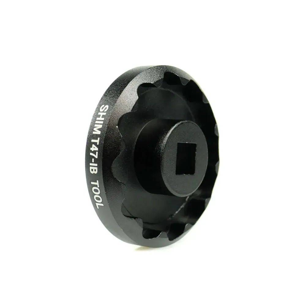 Praxis Works T47 internal bearing Shimano bottom bracket installation and removal tool in a workshop setting.
