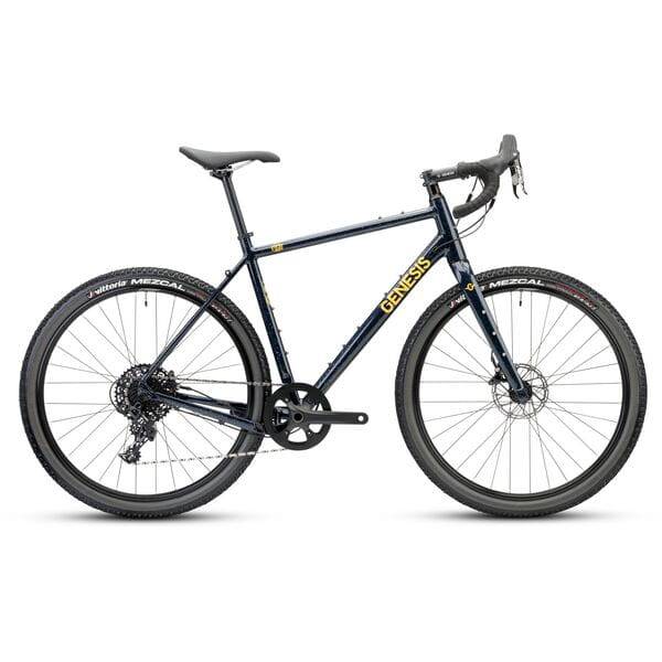 Genesis Fugio 30 gravel bike with SRAM Apex 1x11 drivetrain and hydraulic brakes, featuring a rugged frame and off-road tires.