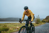 Madison Roam women's lightweight windproof packable jacket displayed folded and partially unfolded on a plain background.
