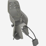 Urban Iki U-ME rear child seat mounted on bike frame, showing secure attachment and comfortable seating for children.