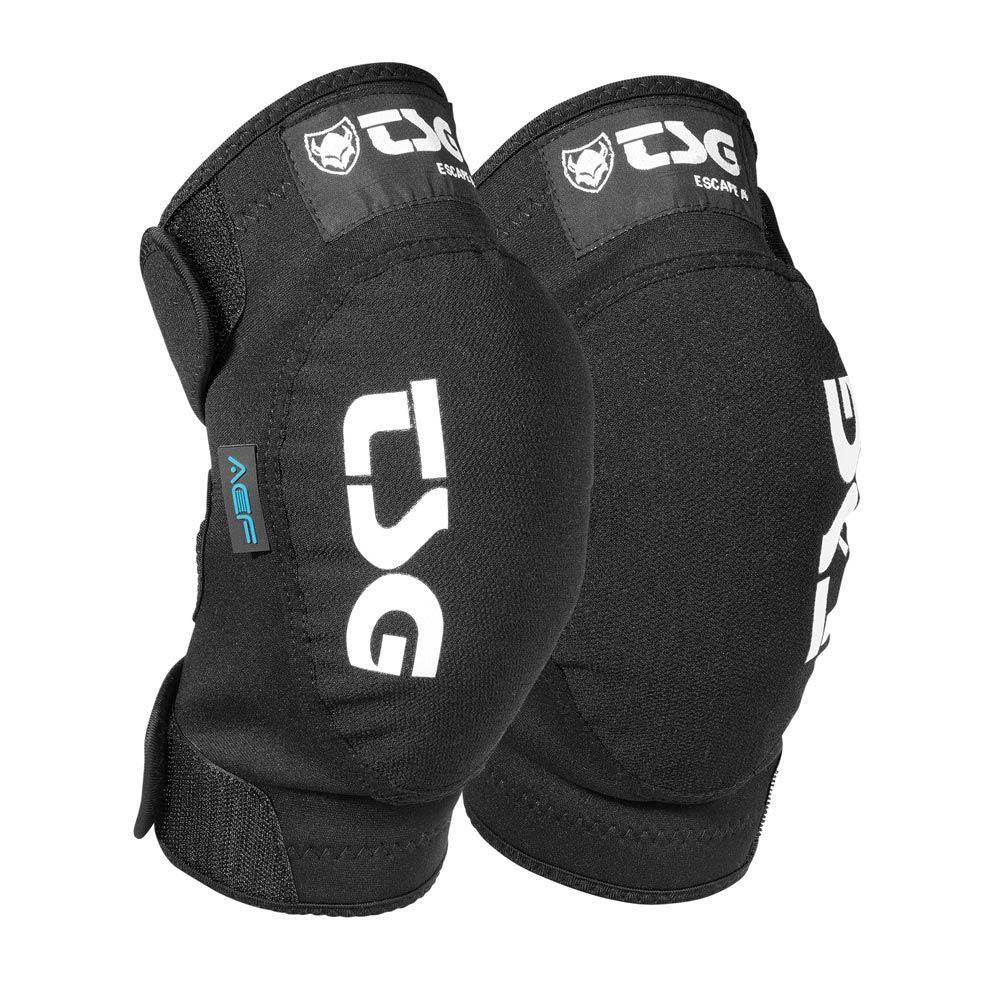 Youth TSG knee guard for mountain biking, showing protective padding and adjustable straps for knee safety during outdoor rides.