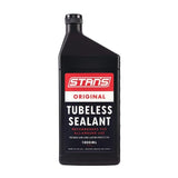 Stan's No Tubes tubeless tyre sealant 1000ml bottle for road and MTB bikes, ideal for tubeless bike tyre maintenance.