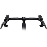 Shimano GRX hydraulic disc brake lever and rear caliper, model BL-RX825 and BR-RX820, mounted on a bicycle handlebar.