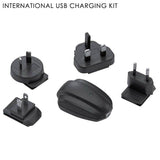 Lezyne USB charging kit for LED lights with global plug adapters, compact accessories for convenient charging and travel.