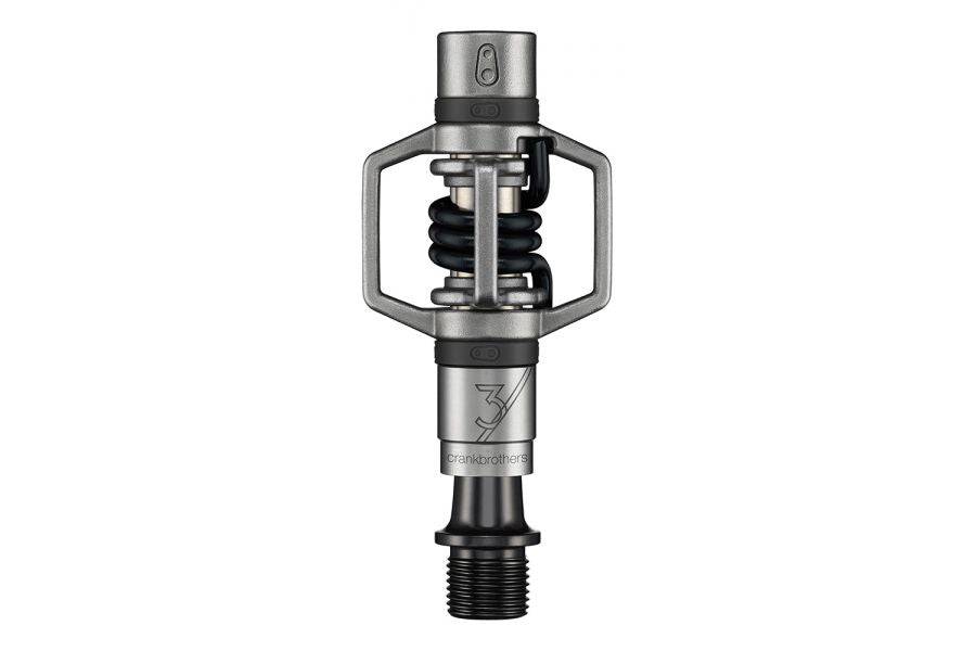 Crankbrothers Eggbeater 3 silver and black MTB pedals with mud shedding design, lightweight cycling components for mountain biking.