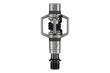 Crankbrothers Eggbeater 3 silver and black MTB pedals with mud shedding design, lightweight cycling components for mountain biking.