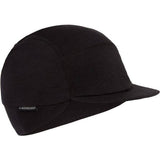 Madison Merino Wool winter cycling cap with peaked brim, designed for warmth and style in cold weather outdoor activities.
