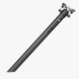 USE Evo 3K Carbon Fiber bike seatpost with finishing kit mounted on a bicycle frame, showcasing lightweight, durable cycling components.