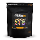 Assorted TORQ Organic Vegan Energy Bars Flapjack Sampler Pack featuring six different flavors, displayed in an organized box.