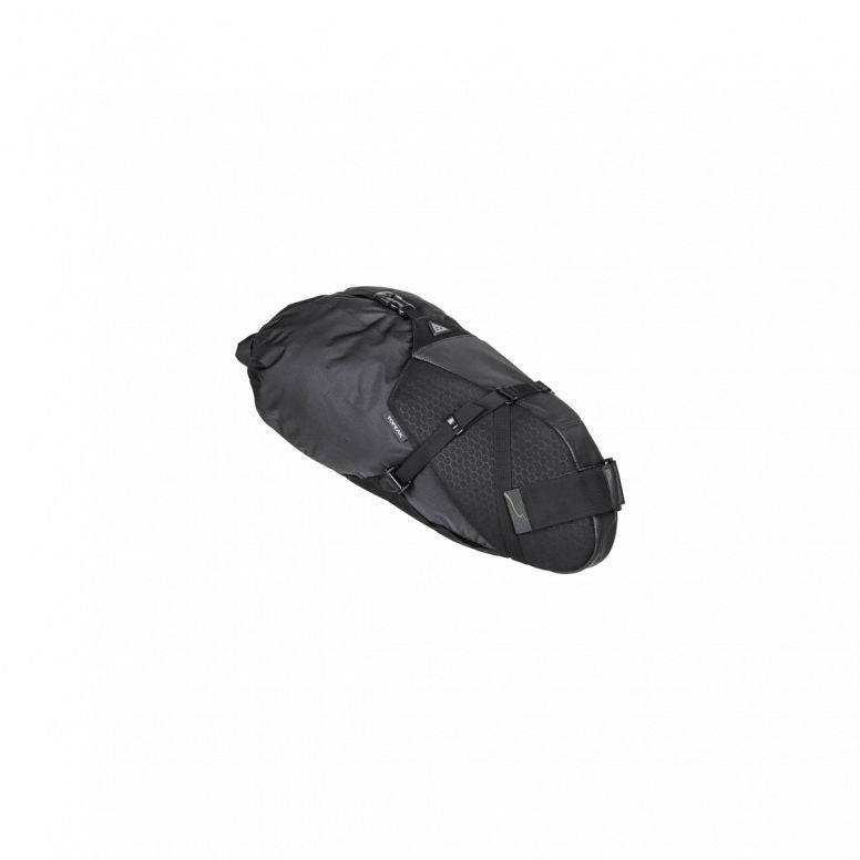 Topeak Backloader X 15L waterproof bikepacking seat bag in black with secure mounting system on a bike seat.