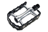 System EX M500 silver and black aluminum bike pedals with CNC CroMo spindles, showcasing durable, lightweight cycling component design.