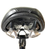 Carradice Cyclo Loops stainless steel saddle bag attachment for bikes, showing durable mounting hardware on a bicycle saddle.