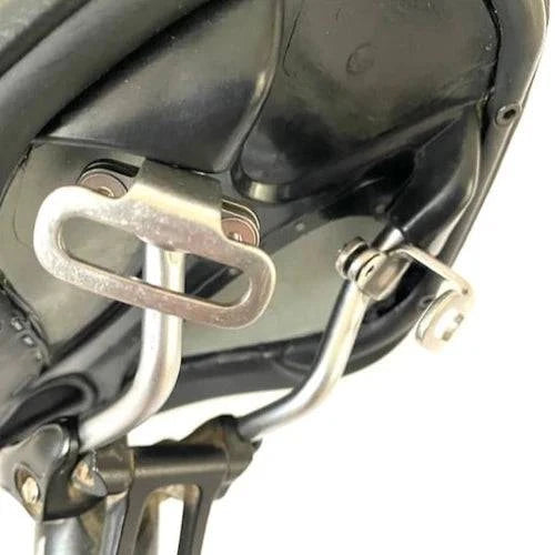 Carradice Cyclo Loops stainless steel saddle bag attachment for bikes, shown mounted on a bicycle saddle.
