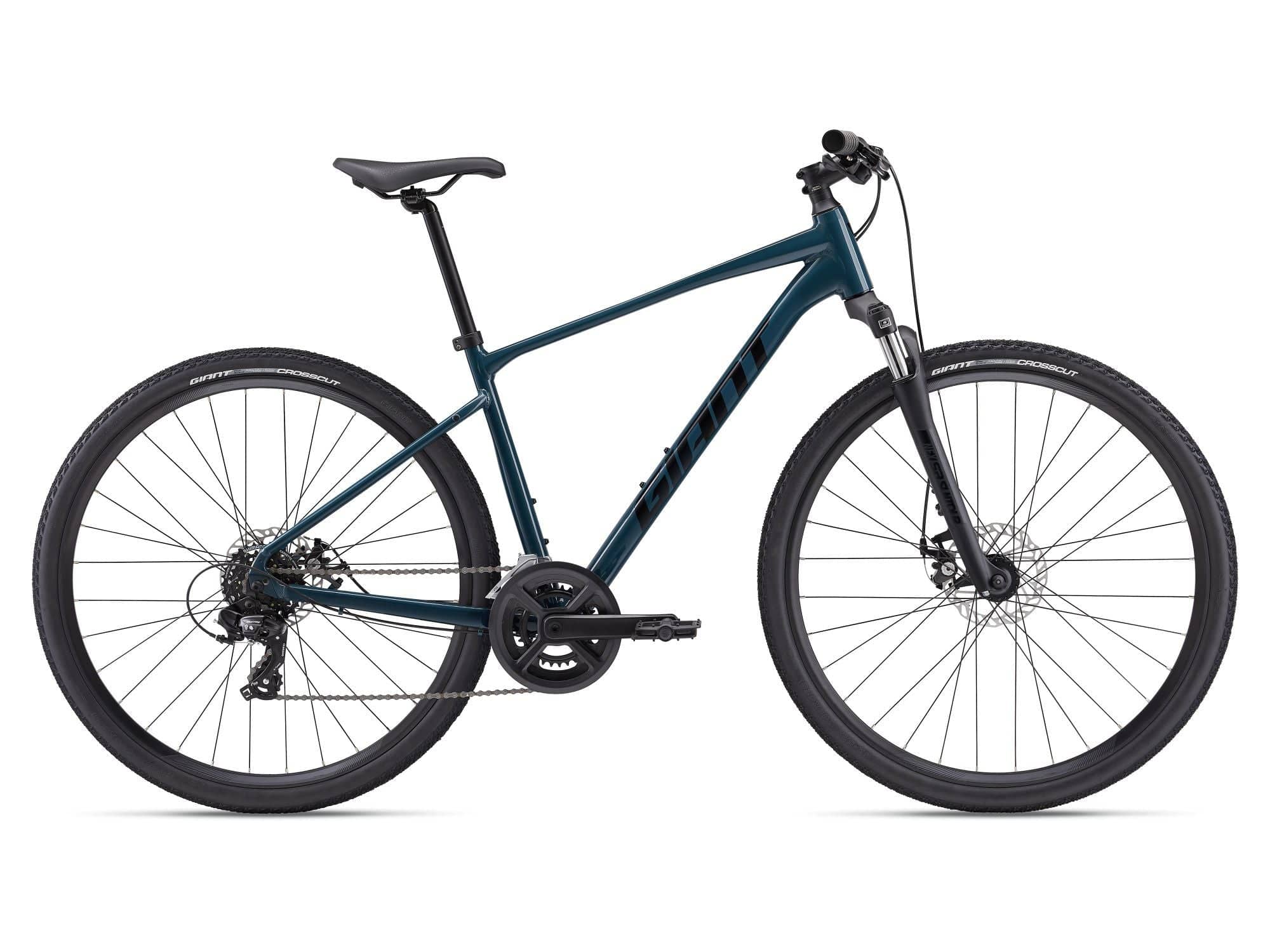 Giant Roam Disc 4 hybrid bike with XL frame, Shimano Tourney gears, and disc brakes, suitable for versatile riding.