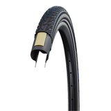 Schwalbe Road Cruiser K-Guard urban bike tire with green compound technology, showing tread pattern and sidewall details.