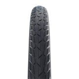 Schwalbe Road Cruiser K-Guard urban bike tire with green compound technology, shown mounted on a bicycle wheel.