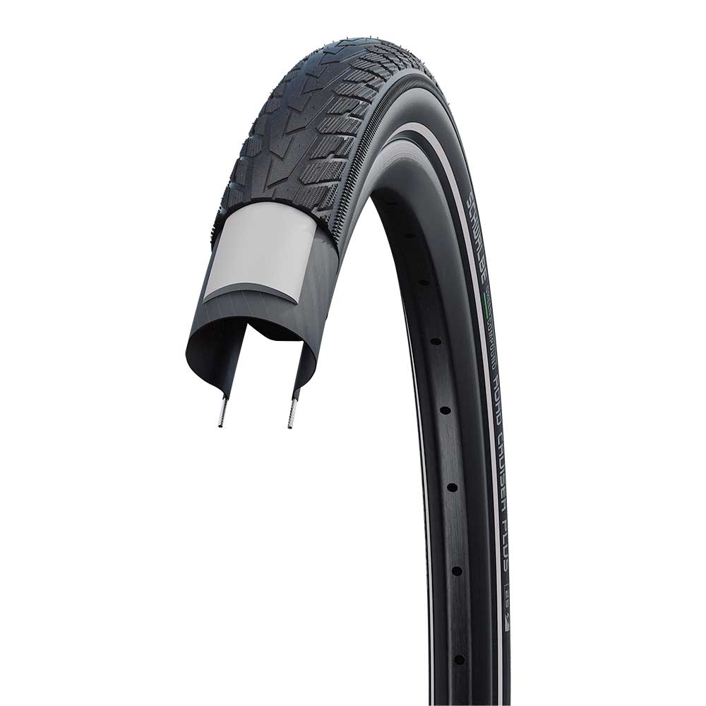 Schwalbe Road Cruiser Plus tire with durable puncture protection and eco-friendly compound, shown mounted on a bicycle wheel.