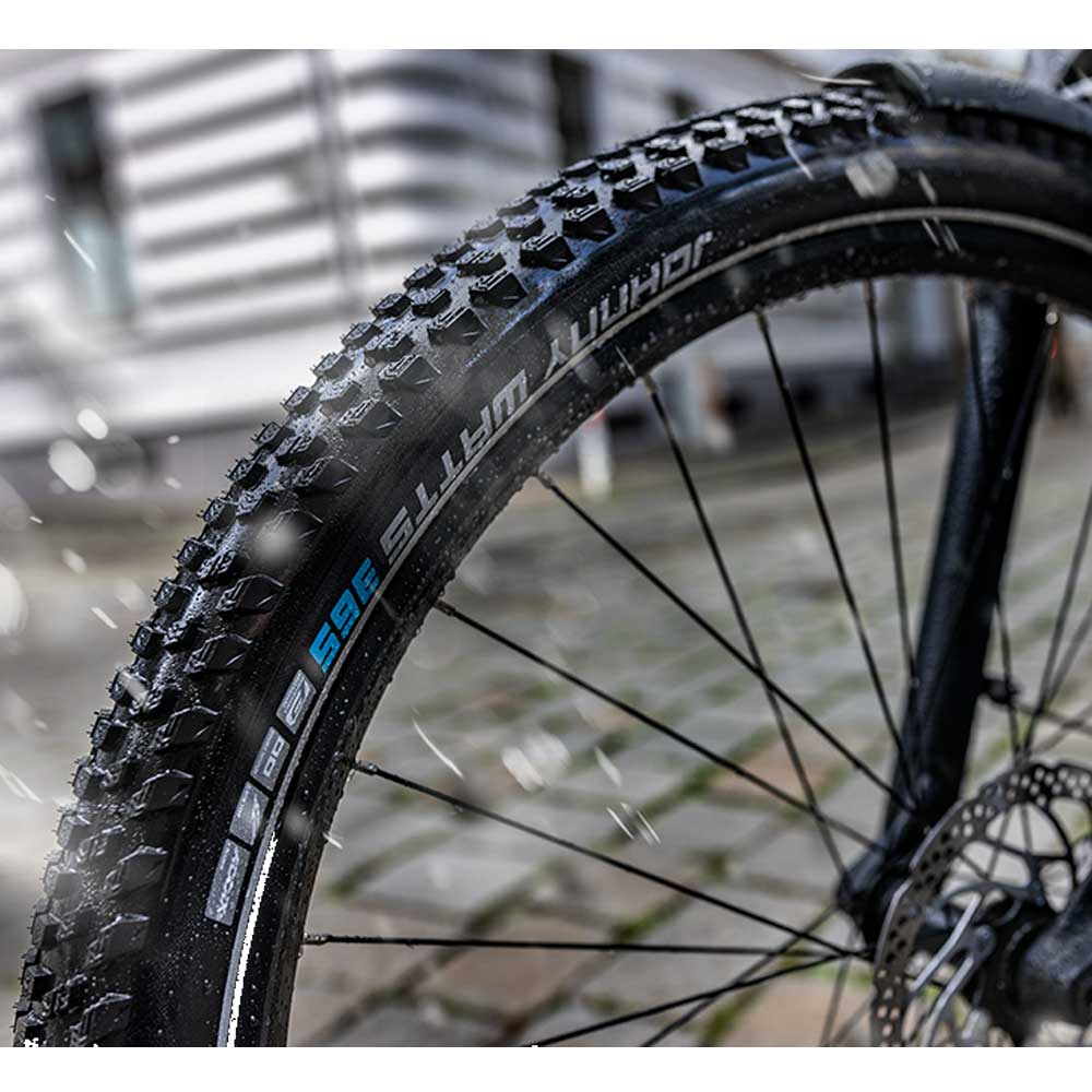 Schwalbe Johnny Watts 365 DD Greenguard puncture protection tire for durable bike components, shown in close-up view.