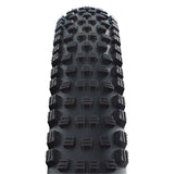 Schwalbe Wicked Will Addix Performance MTB tyre, tubeless-ready, E-50 certified, shown mounted on mountain bike wheel.