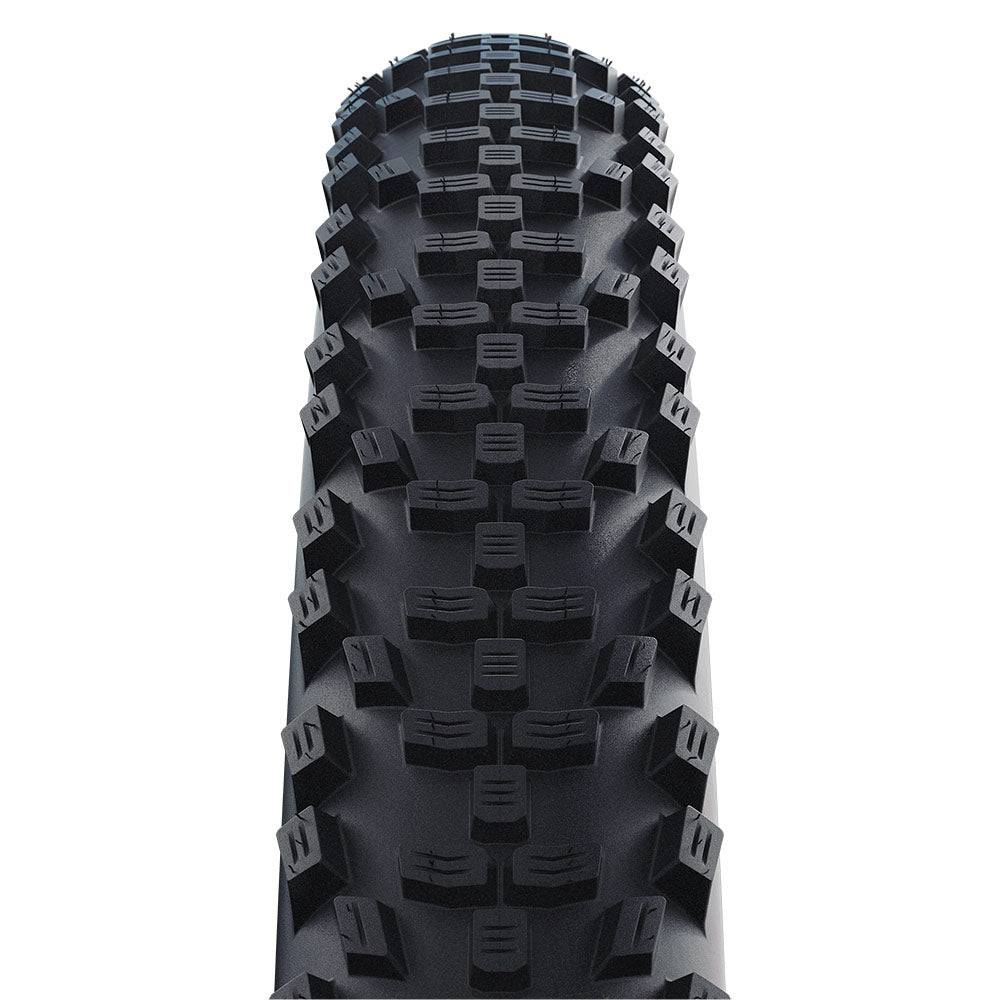 Schwalbe Smart Sam Plus DD E-MTB tyre with Greenguard puncture protection, shown mounted on a bike wheel.