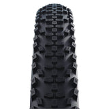 Schwalbe Smart Sam Plus DD E-MTB tyre with Greenguard puncture protection, shown mounted on a bike wheel.