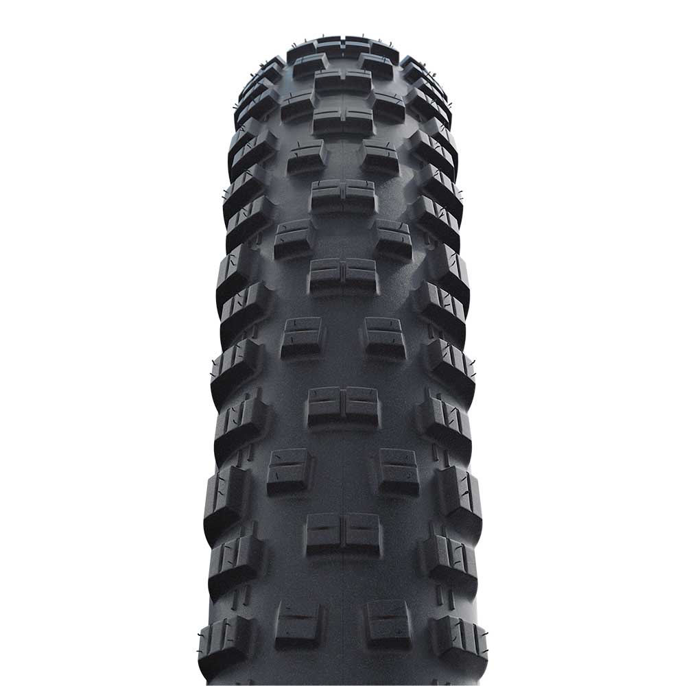 Schwalbe Tough Tom MTB tyre with K-Guard puncture protection, suitable for trail riding, shown mounted on a mountain bike wheel.