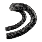 Lizard Skins DSP 3.2mm bar tape with screw-in plugs for grip and comfort on bicycle handlebars.