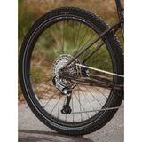 Schwalbe Marathon Mondial Raceguard touring tyre with puncture protection and E-bike readiness, shown mounted on a bicycle wheel.