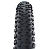 Schwalbe Marathon Plus MTB tyre with SmartGuard puncture protection, suitable for e-bikes, showcasing tread and sidewall details.