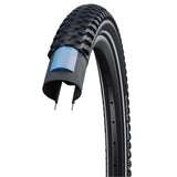 Schwalbe Marathon Plus MTB tyre with SmartGuard puncture protection, designed for e-bikes, showing tread pattern and sidewall branding.