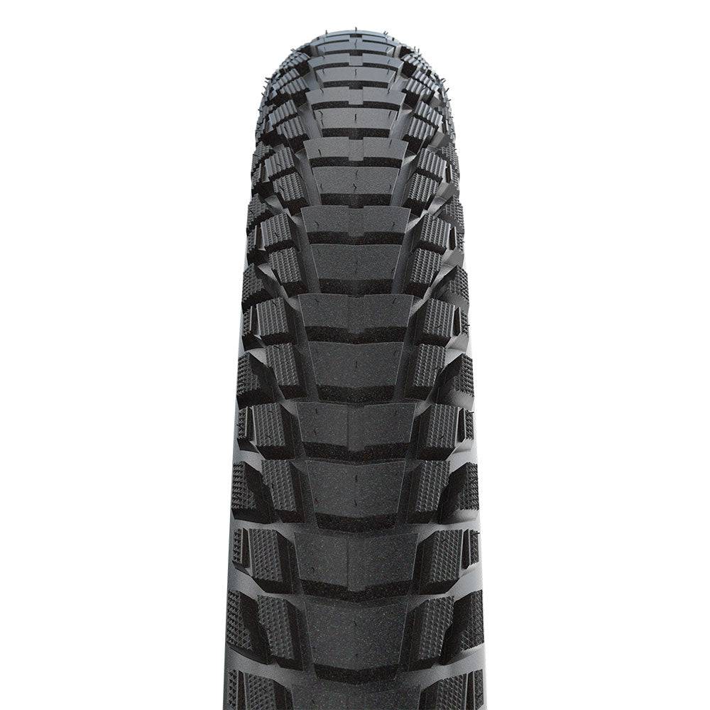 Schwalbe Marathon Plus Tour SmartGuard puncture-resistant e-bike tire with reflective sidewall and durable tread for off-road cycling.