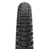 Schwalbe Marathon Plus Tour SmartGuard puncture-resistant e-bike tire with reflective sidewall and durable tread for off-road cycling.
