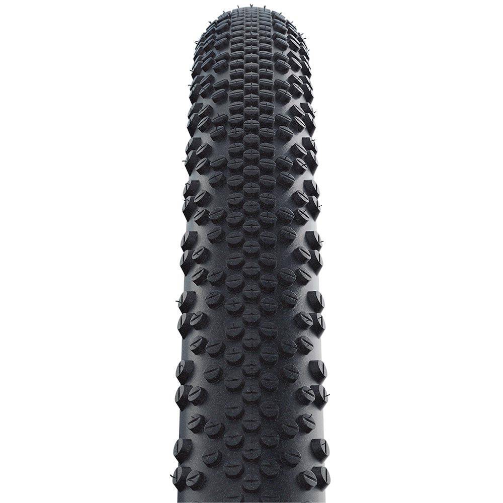 Schwalbe G-One Bite Evo gravel tire with tubeless-ready design, featuring a superground tread for off-road and gravel cycling.
