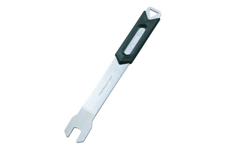 Topeak 15mm pedal wrench in black and silver for easy bike pedal removal and installation, shown in workshop setting