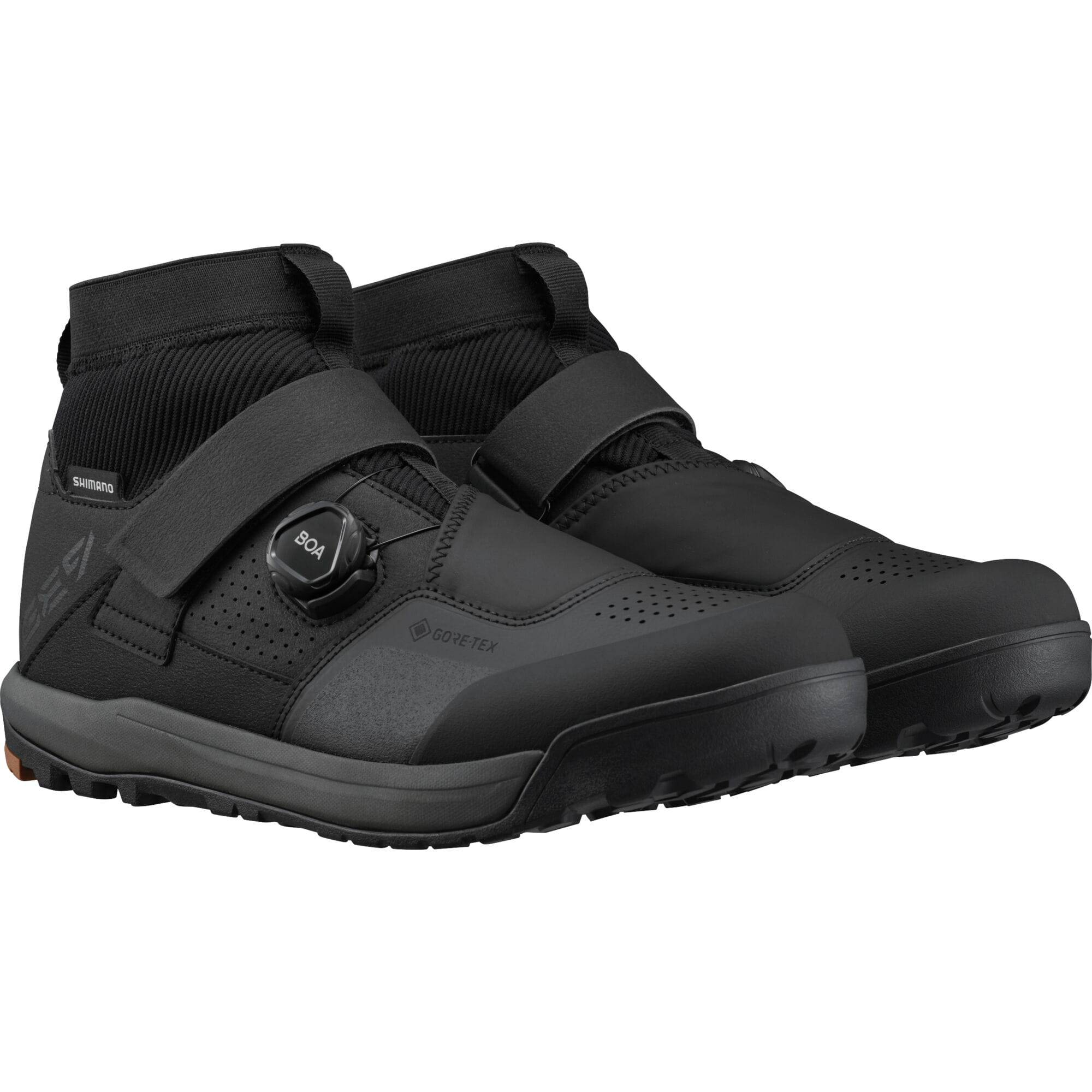 Shimano GE9 GORE-TEX mountain bike shoes with BOA Fit System, showing black waterproof shoes with secure dial closure.
